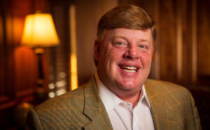An image of Bill Courtney smiling.