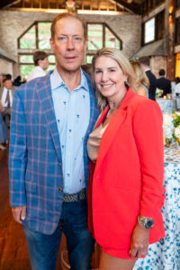 A couple poses for a photo. 